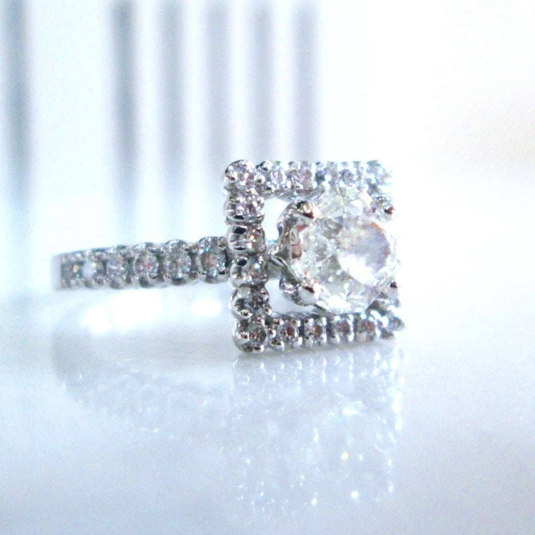 14ct White Gold Radiant & Brilliant Cut Diamond Solitaire Halo Ring