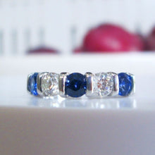 Load image into Gallery viewer, Platinum 1.25ct Brilliant Cut Diamond &amp; Sapphire Tension Set Eternity Ring
