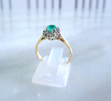 Load image into Gallery viewer, 1980s 9ct Yellow Gold Oval Cut Emerald &amp; Diamond Cluster Halo Ring
