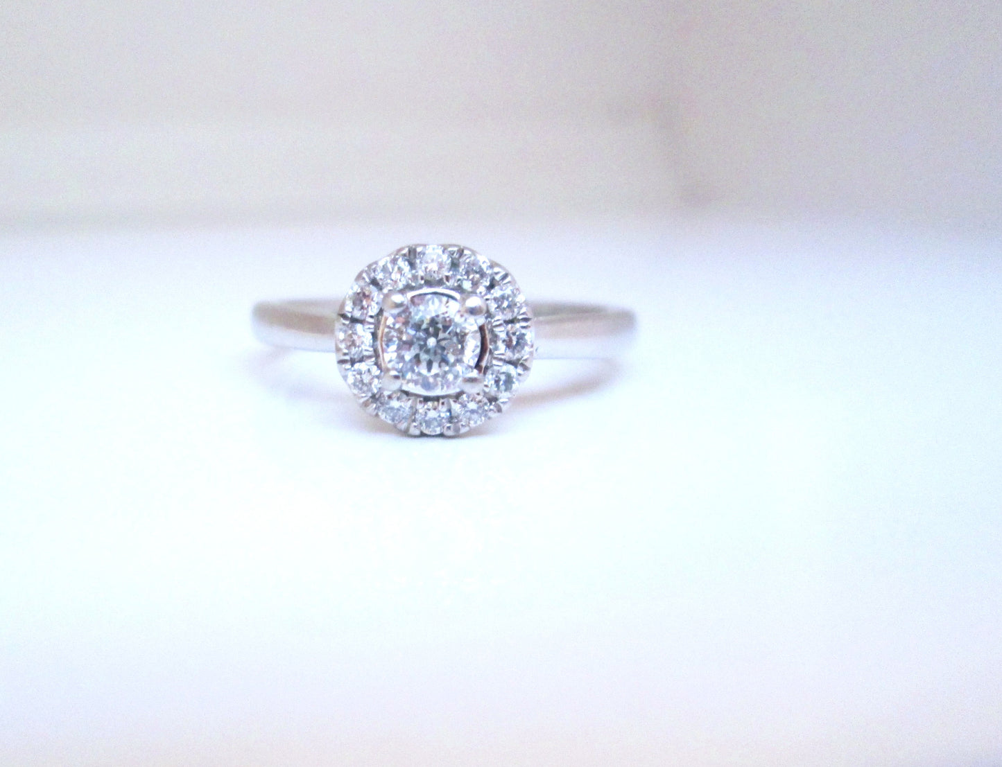 Platinum Round Brilliant Cut Forever Diamond Halo Cluster Ring