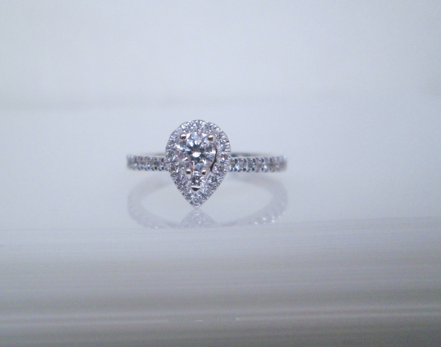 18ct White Gold .52ct Diamond Halo Pear Shaped Cluster Ring