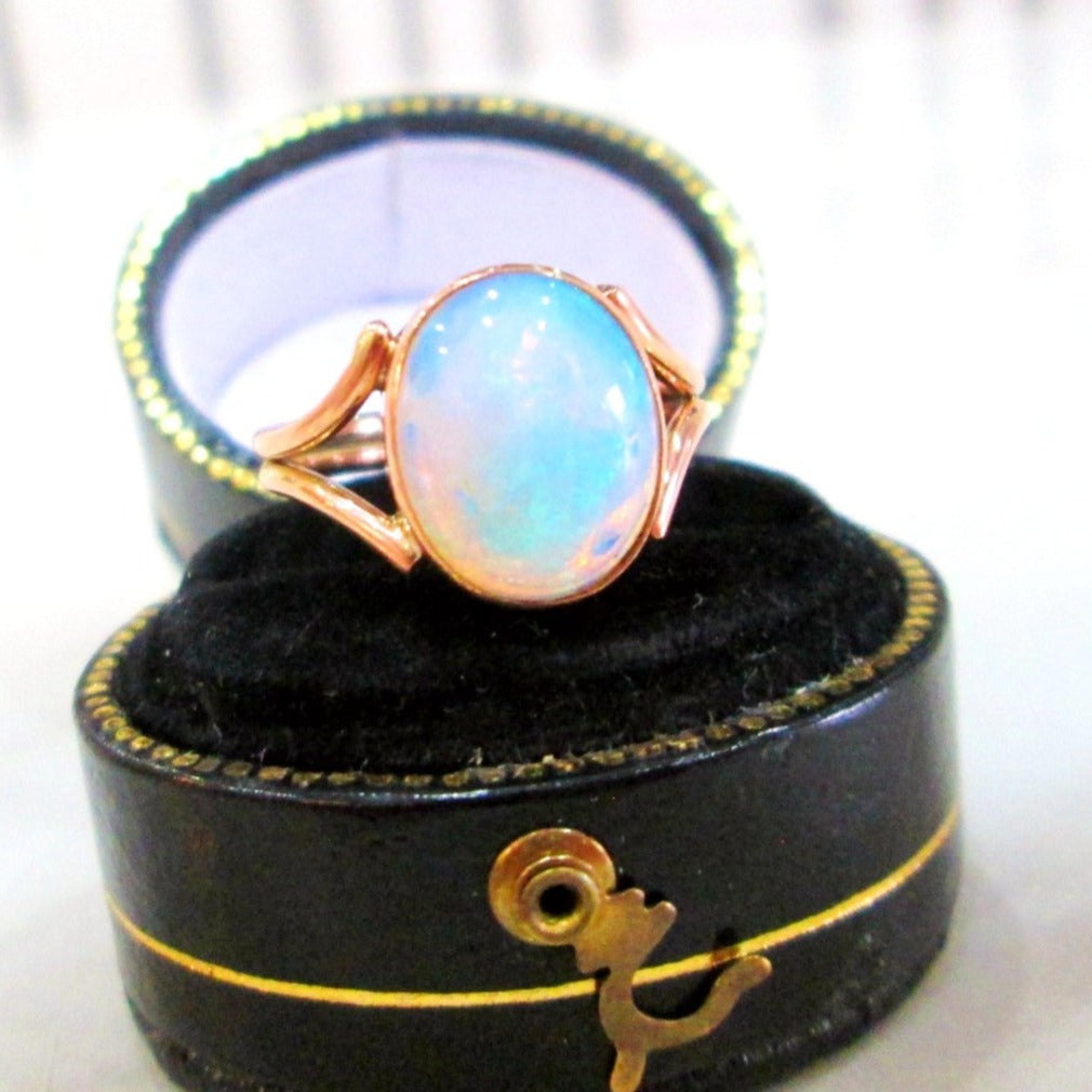 9ct Rose Gold Oval Cut Opal Bezel Set Solitaire Ring