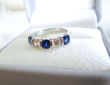 Load image into Gallery viewer, Platinum 1.25ct Brilliant Cut Diamond &amp; Sapphire Tension Set Eternity Ring
