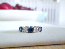 Load image into Gallery viewer, Platinum 1.25ct Brilliant Cut Diamond &amp; Sapphire Tension Set Eternity Ring
