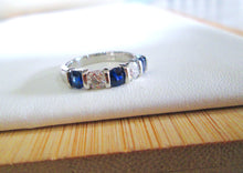 Load image into Gallery viewer, Platinum 1.25ct Brilliant Cut Diamond &amp; Sapphire Tension Set Eternity Ring
