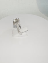 Load and play video in Gallery viewer, 14ct White Gold Radiant &amp; Brilliant Cut Diamond Solitaire Halo Engagement Ring

