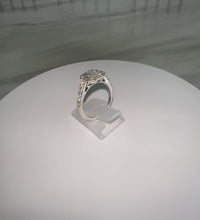 Load and play video in Gallery viewer, 9ct White Gold Princess &amp; Round Brilliant Cut Princessa Diamond Halo Cluster Ring
