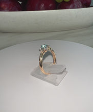 Load and play video in Gallery viewer, 9ct Yellow Gold &amp; Platinum Old Cut Blue Zircon &amp; Diamond Trilogy Ring
