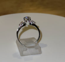 Load and play video in Gallery viewer, 1960s 18ct White Gold .50ct Brilliant Cut Diamond Solitaire Ring
