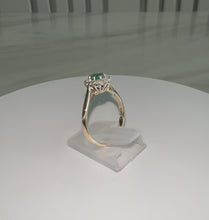 Load and play video in Gallery viewer, 1980s 9ct Yellow Gold Oval Cut Emerald &amp; Diamond Cluster Halo Ring
